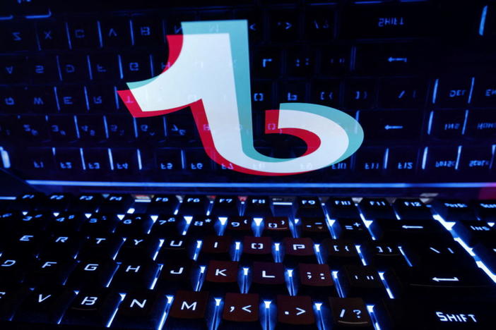 A keyboard is placed in front of a displayed TikTok logo in this illustration taken February 21, 2023. REUTERS/Dado Ruvic/Illustration