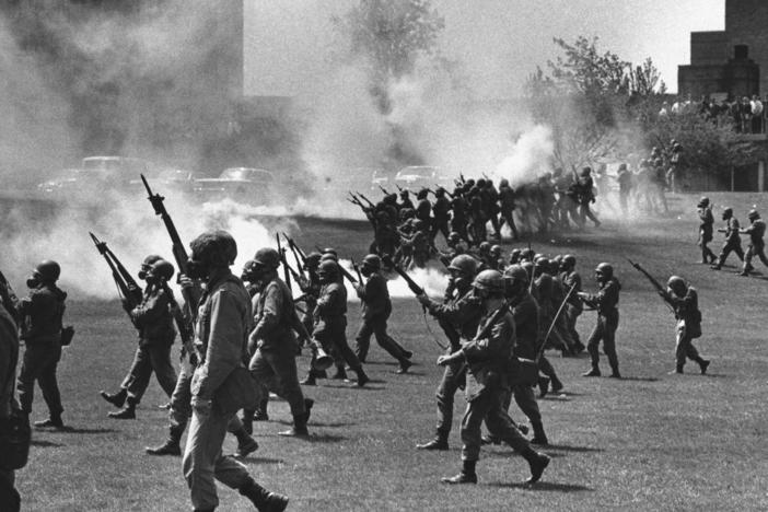 Ohio National Guard members towards students at Kent State University in Kent, Ohio, on May 4, 1970. They fired into the crowd, killing four students and injuring nine.