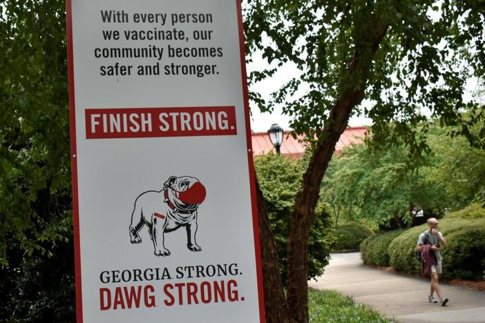 UGA campus with vaccine sign