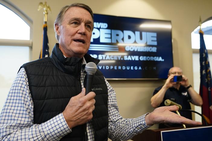 Republican candidate for Georgia Governor former Sen. David Perdue arrives to speaks at a campaign stop at the Covington airport Wednesday, Feb. 2, 2022, in Covington, Ga.