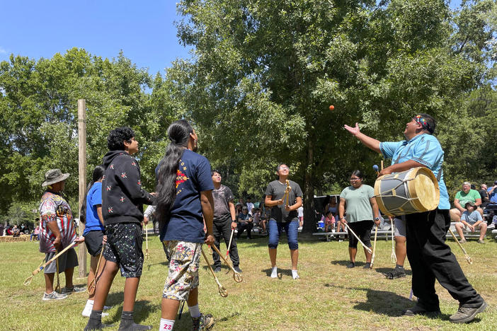 Choctaw teenagers demonstrate stickball at the 30th annual Ocmulgee Indigenous Celebration on Saturday, Sept. 17, 2022 in Macon, Ga. The game traditionally involved up to hundreds of players at a time, and was used as an alternative to war for settling disputes. 