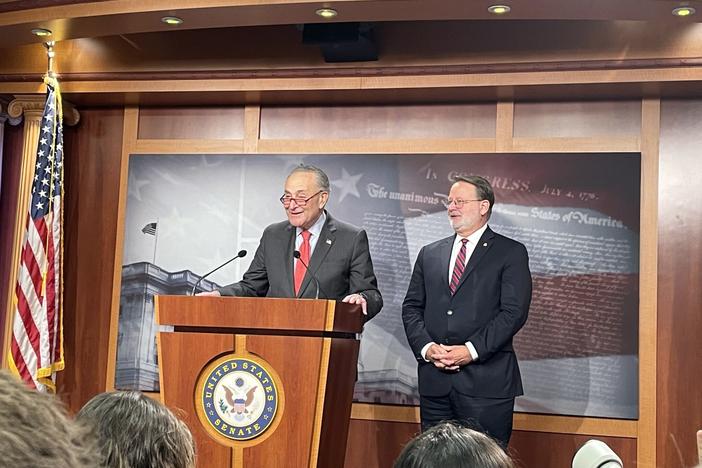  U.S. Senate Majority Leader Chuck Schumer and Sen. Gary Peters of Michigan, the chair of the Democratic Senatorial Campaign Committee, talk to reporters at the U.S. Capitol the morning after Sen. Raphael Warnock won the Georgia Senate runoff. Ariana Figueroa/States Newsroom