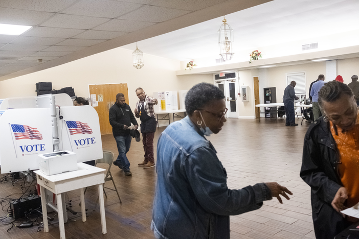 Voting shortly after the 7am opening of the Glorious Hope Baptist Church polling station in Macon.