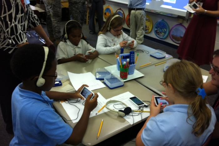 Students doing high-tech work at Taylor's Creek Middle School