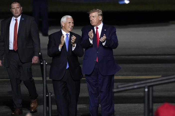 Vice President Mike Pence and President Trump at a campaign rally at Newport News, Va., on Sept. 25, a week before Trump was hospitalized with COVID-19.