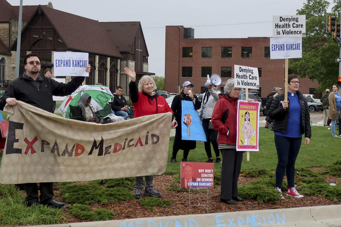 Advocates for expanding Medicaid in Kansas staged a protest outside the entrance to the statehouse parking garage in Topeka in May 2019. Today, twelve states have still not expanded Medicaid. The biggest are Texas, Florida, and Georgia, but there are a few outside the South, including Wyoming and Kansas.