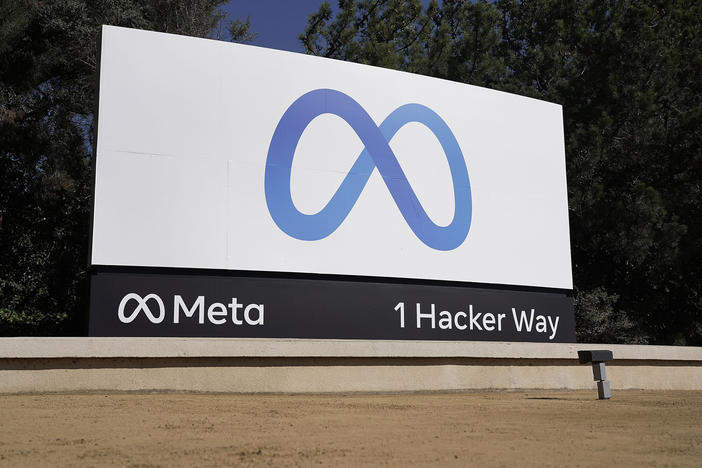 Facebook's Meta logo sign at the company headquarters in Menlo Park, Calif., in 2021. Anyone in the U.S. who has had a Facebook account at any time since May 24, 2007, can now apply for their share of a $725 million privacy settlement that parent company Meta has agreed to pay. Meta is paying to settle a laws