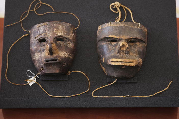 Two masks of the Indigenous community of the Kogi from the Sierra Nevada de Santa Marta in Colombia are displayed at the presidential palace in Berlin on June 16, 2023.