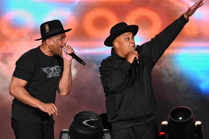 Darryl McDaniels (L) and Joseph Simmons (R) of Run-DMC, closing the Hip Hop 50 Live concert at Yankee Stadium in the Bronx, N.Y. early Saturday morning.