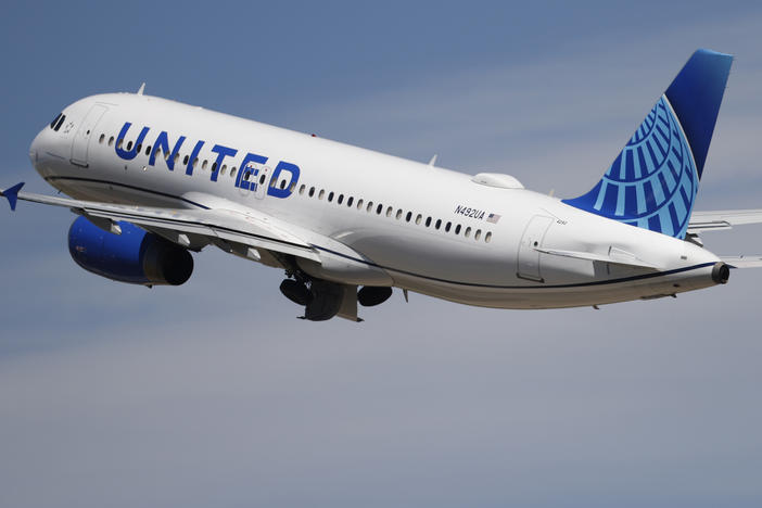 A United Airlines jetliner lifts off from a runway at Denver International Airport on June 10, 2020, in Denver. Two United Airlines flight attendants have filed a lawsuit against the company, alleging they were excluded from working charter flights for the Los Angeles Dodgers because of their race, age, religion and appearance.