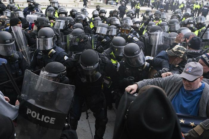 In this Jan. 6, 2021, file photo, U.S. Capitol Police push back rioters trying to enter the U.S. Capitol in Washington.