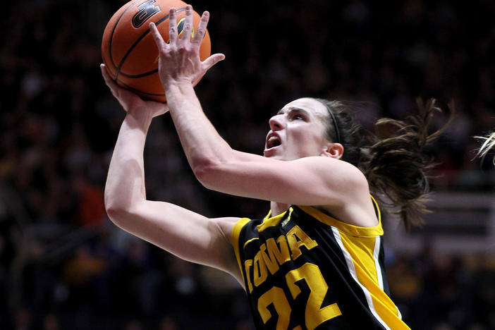 Caitlin Clark shoots the ball against the Purdue Boilermakers in January in West Lafayette, Indiana.