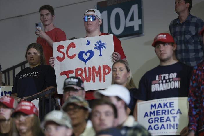 Supporters of Republican presidential candidate and former President Donald Trump listen while he speaks during a Get Out The Vote rally at Coastal Carolina University on Feb. 10 in Conway, S.C.