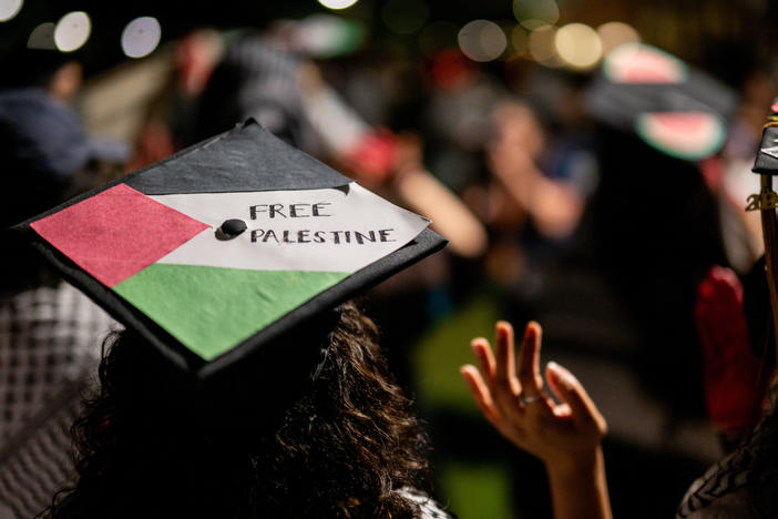 Graduate students and demonstrators at the University of Texas at Austin protest the war in Gaza after walking out of commencement at the DKR-Texas Memorial Stadium on May 11, 2024 in Austin.
