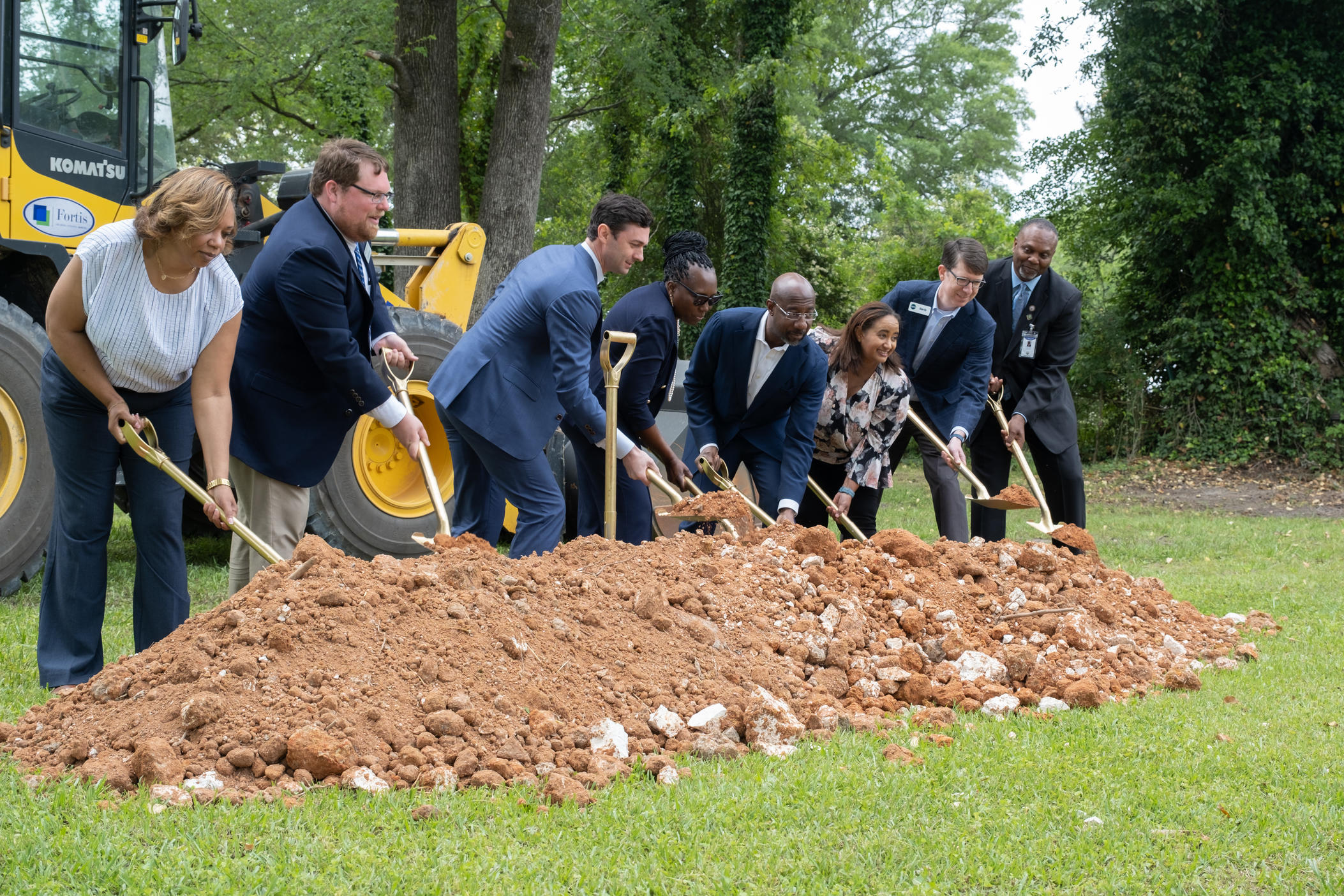 U.S. Sens. Jon Ossoff and Raphael Warnock join county and city leaders at the groundbreaking of the new sewer system in McIntyre, Ga., on April 24, 2023.