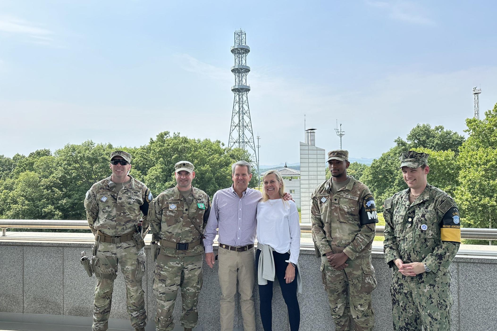 Georgia Gov. Brian Kemp and first lady Marty Kemp are pictured with U.S. military personnel at the DMZ on Wed., June 13, 2024.
