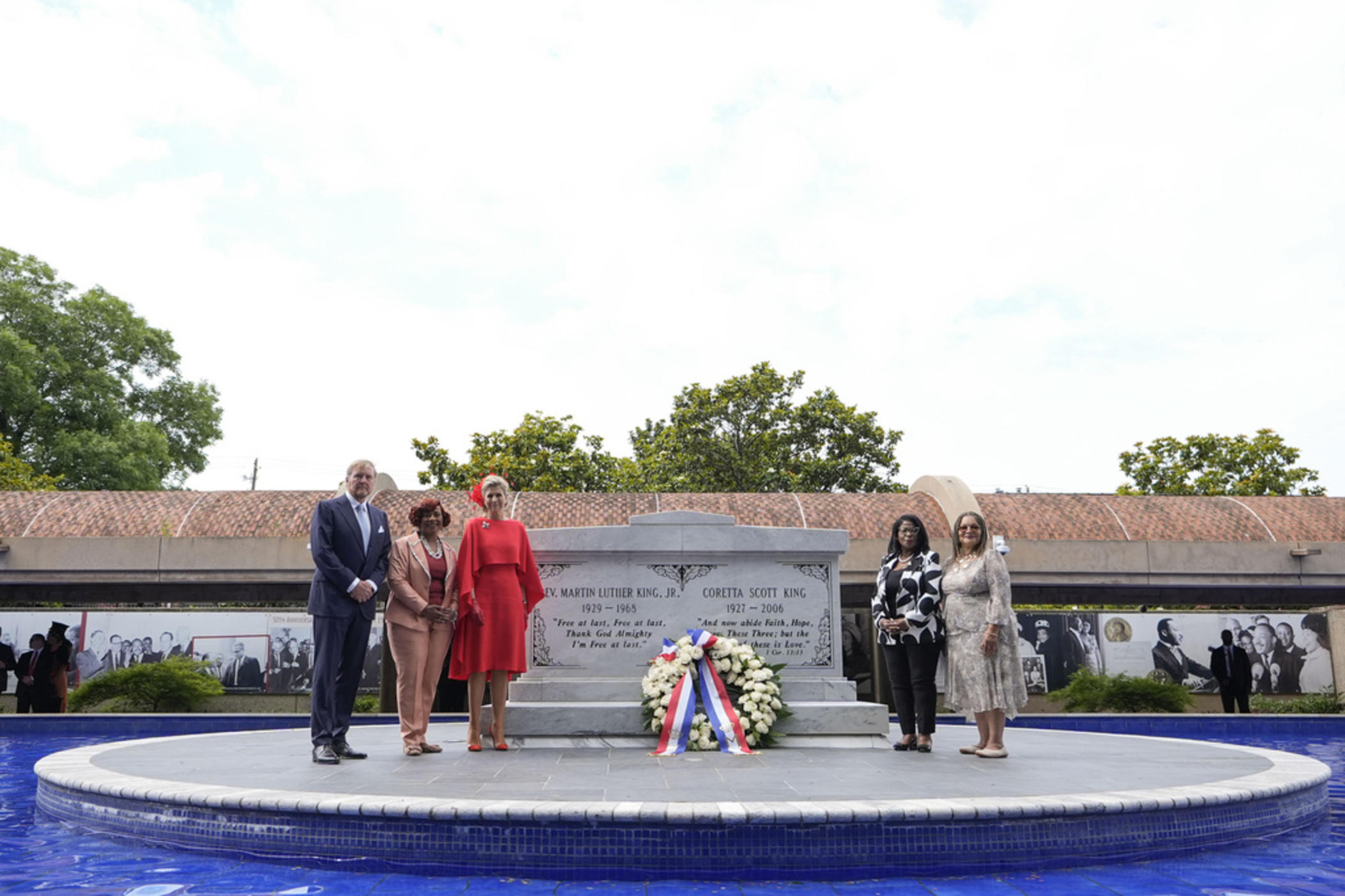 From left to right, King Willem-Alexander, King's daughter Bernice King and Queen Maxima of the Netherlands, pose for a photograph after placing a wreath at the tombs of Martin Luther King Jr., and Coretta Scott King, during a visit to the King Center, Monday, June 10, 2024, in Atlanta. (AP Photo/Brynn Anderson)