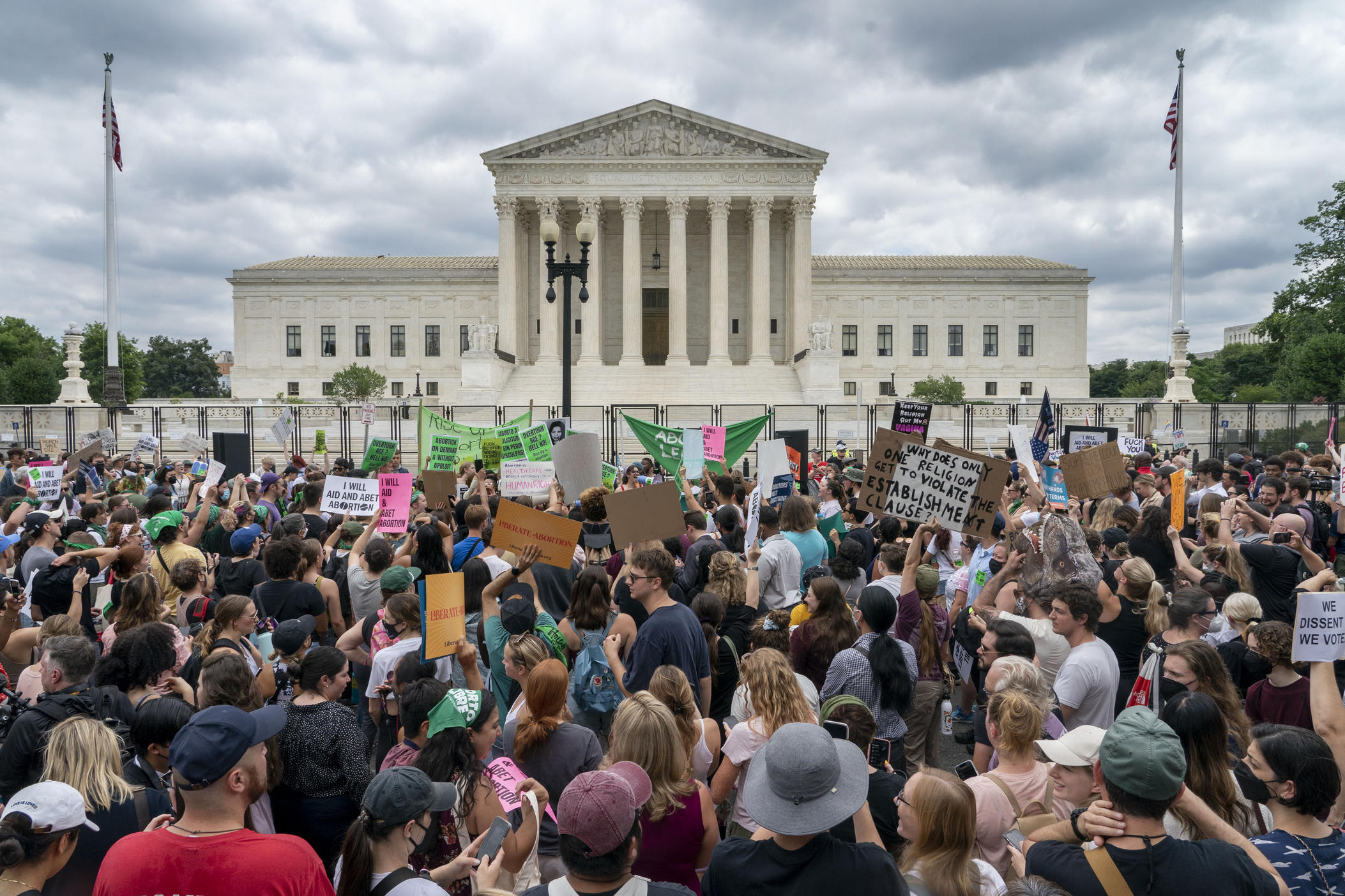 Abortion-rights protesters regroup and protest following Supreme Court's decision to overturn Roe v. Wade, federally protected right to abortion, outside the Supreme Court in Washington, Friday, June 24, 2022.