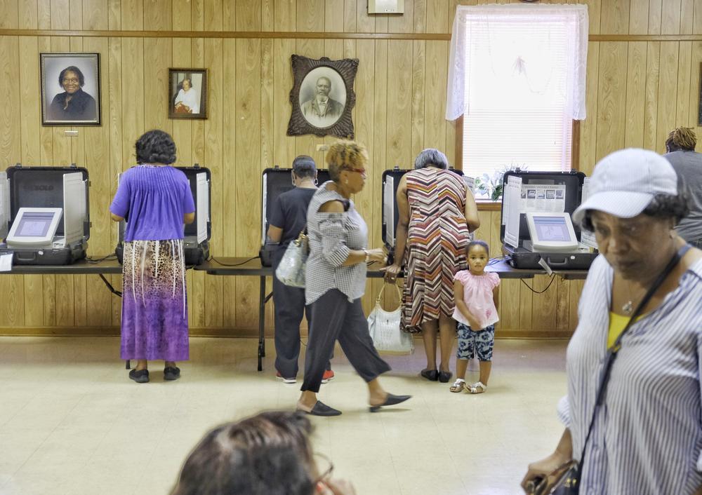 Voters at a polling station in this file photo from GPB's Grant Blankenship.