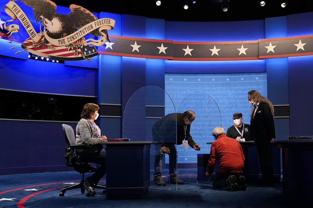 Production crews work on the set of the Vice Presidential Debate.