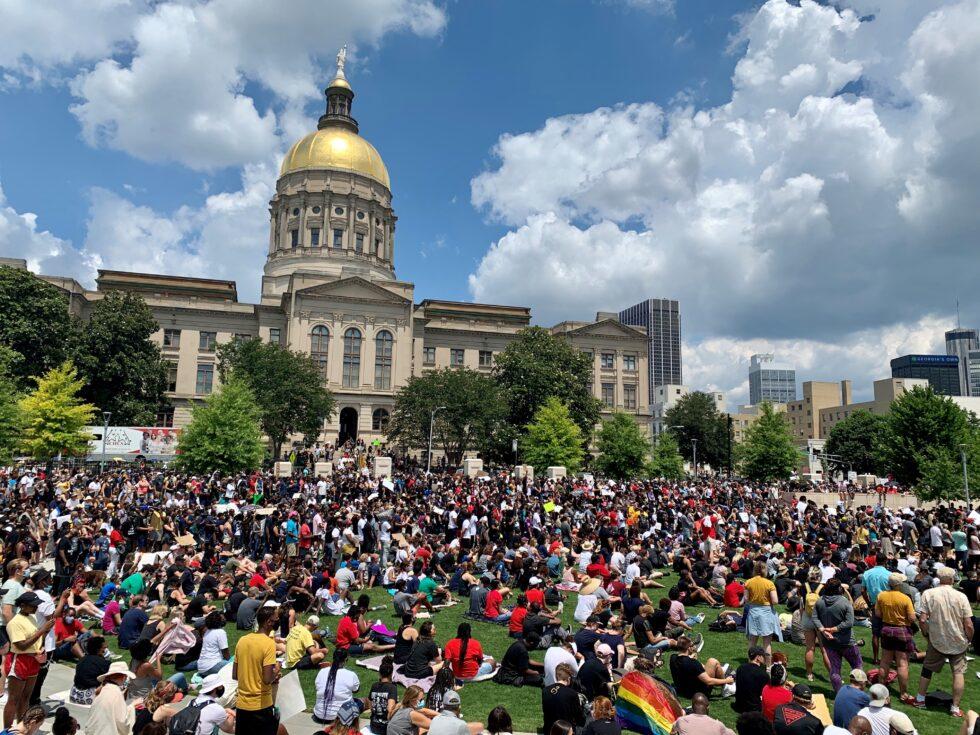 Thousands gathered outside the State Capitol to protest police brutality and racial injustice as lawmakers met for the 2020 legislative session on June 19, 2020. 