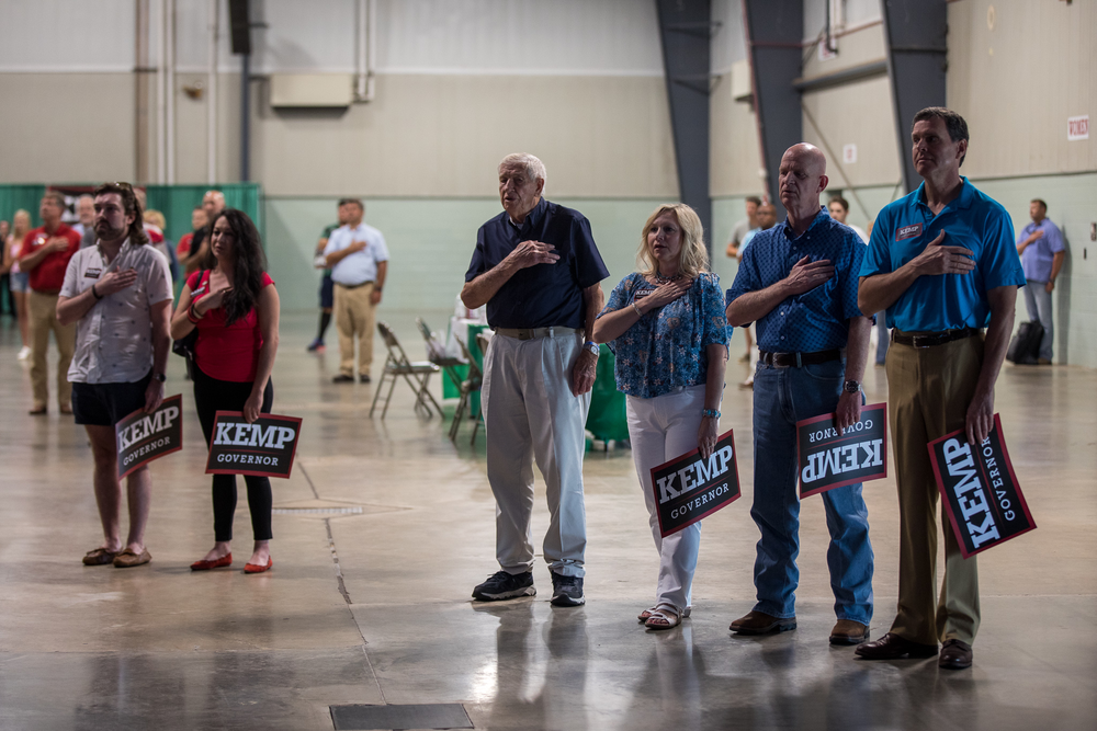 Supporters of Republican Gov. Brian Kemp gather at the Georgia National Fairgrounds in Perry, Ga., on July 10, 2021, to support his reelection bid. 
