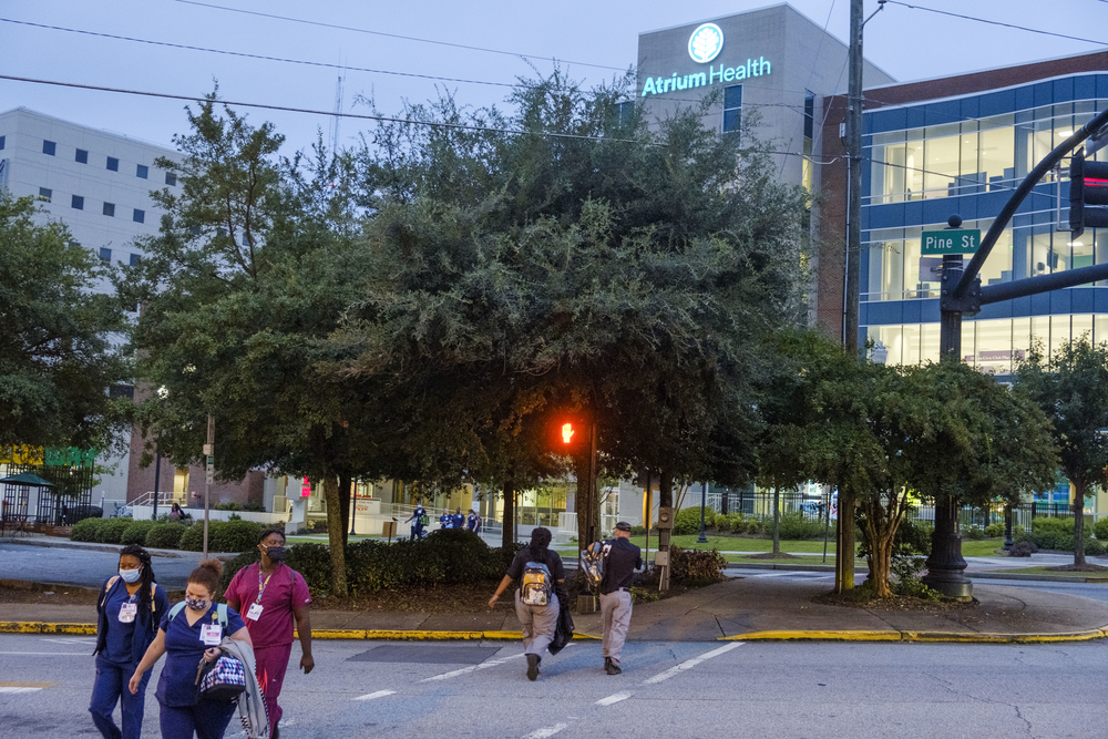 Employees during 7am shift change Friday at the Medical Center at Atrium Health in Macon.