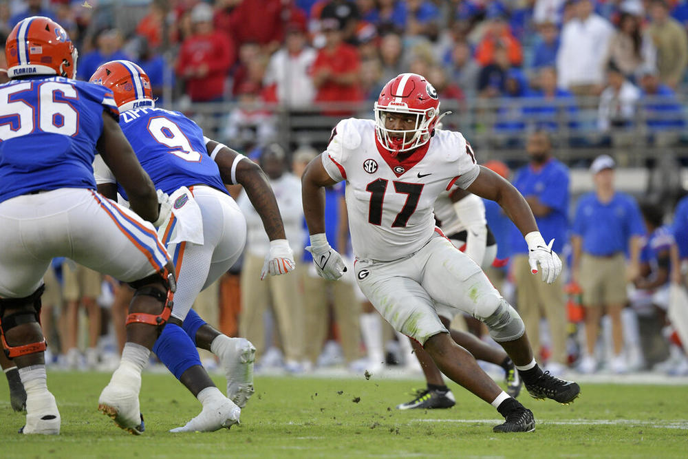 Georgia linebacker Nakobe Dean (17) follows a play during the second half of an NCAA college football game against Florida, Oct. 30, 2021, in Jacksonville, Fla. 