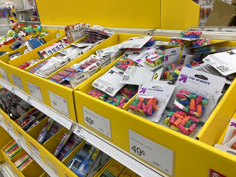 Bins are filled with packages of erasers large and small in the school supply section of a Target store Wednesday, July 20, 2022, in Aurora, Colo. (AP Photo/David Zalubowski)
