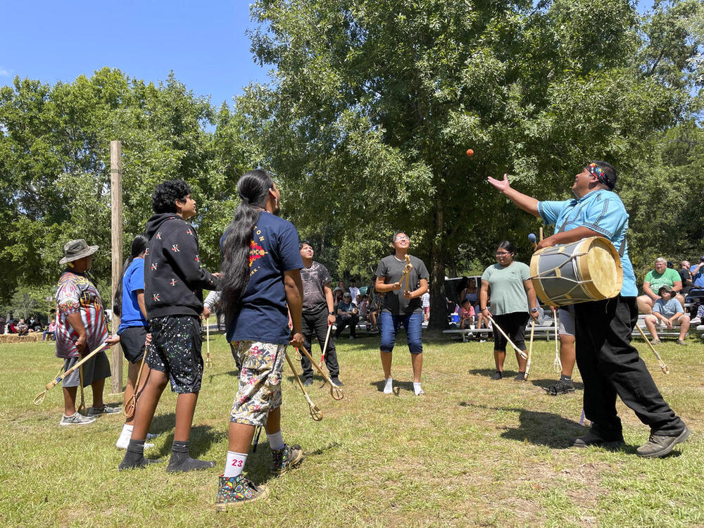 Choctaw teenagers demonstrate stickball at the 30th annual Ocmulgee Indigenous Celebration on Saturday, Sept. 17, 2022 in Macon, Ga. The game traditionally involved up to hundreds of players at a time, and was used as an alternative to war for settling disputes. 