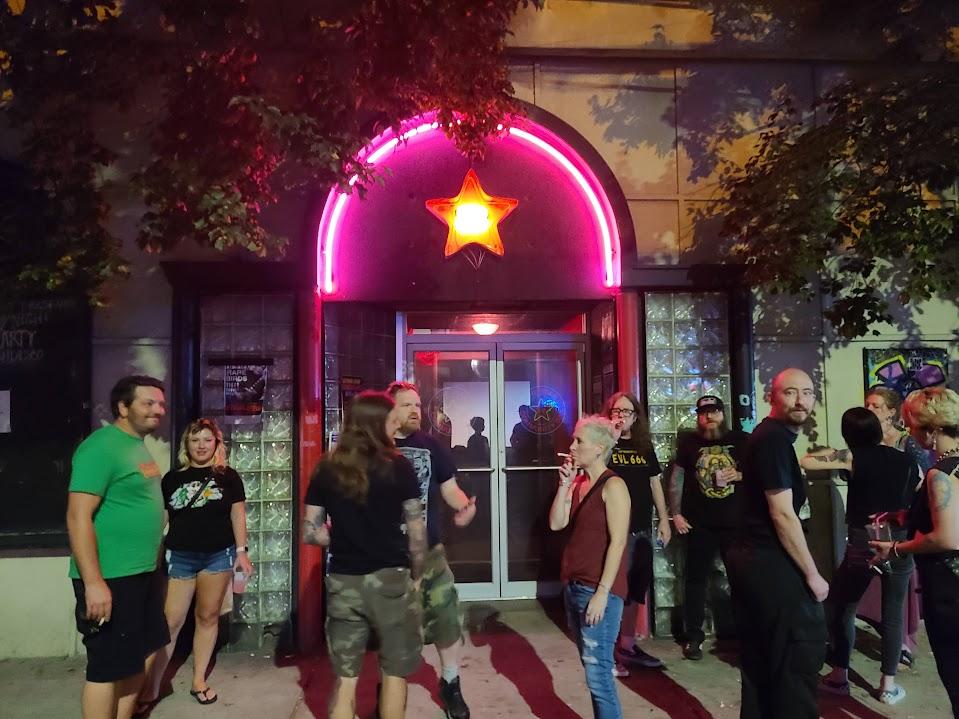 Patrons gathered outside of Star Community Bar following a community meeting September 18, 2022.