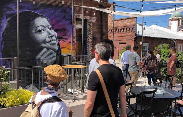 Kevin Scene Lewis painted the murals at the Woodward Hotel, including this portrait of Alice Walker. (Liz Fabian)
