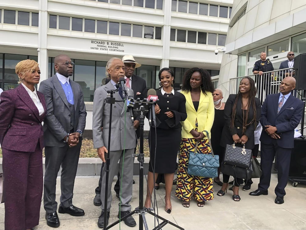 The Rev. Al Sharpton speaks outside the Richard B. Russell federal courthouse in Atlanta, on Tuesday, Sept. 26, 2023. To his left in the black dress is Fearless Fund CEO and co-founder Arian Simone. A judge Tuesday refused to block a grant program the fund administers for Black women entrepreneurs, saying a lawsuit arguing it illegally excluded other races was not likely to succeed. 