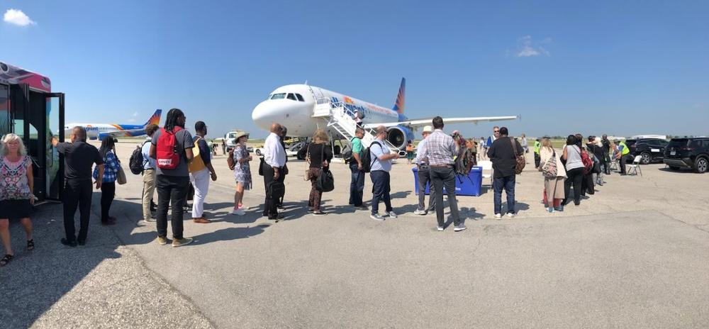 The 2023 Ocmulgee to Okmulgee Tour traveled on a chartered jet from Middle Georgia Regional Airport to Tulsa, Oklahoma. (Liz Fabian)