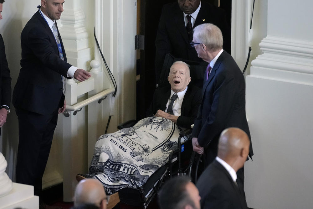 Former President Jimmy Carter sits front row at Rosalynn Carter s