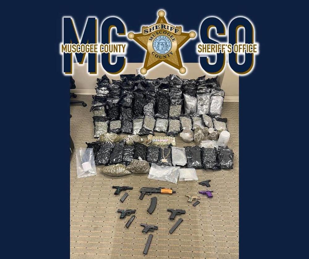 A picture of drugs, guns and cash seized by the Muscogee County Sheriff’s Office through multiple search warrants in Muscogee County. Chelsey Brooks Photo courtesy of the Muscogee County Sheriff's Office Facebook page.  