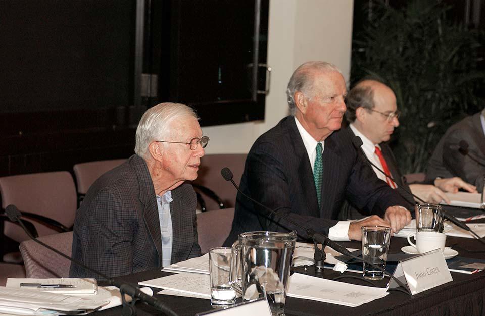 Former U.S. President Jimmy Carter (left) and former U.S. Secretary of State James Baker (center) speak at events associated with the 2005 Carter-Baker Commission on Federal Election Reform.