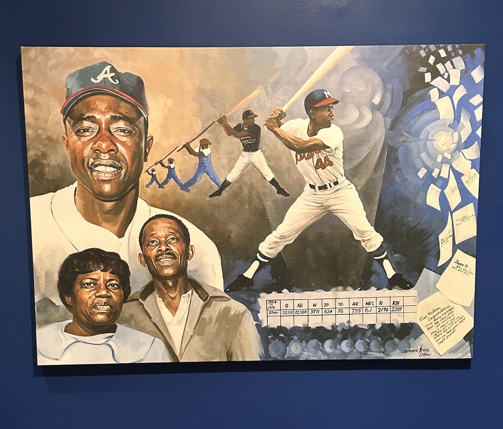 A painting of Hank Aaron is displayed for the "More Than Brave" exhibit at the Atlanta History Center