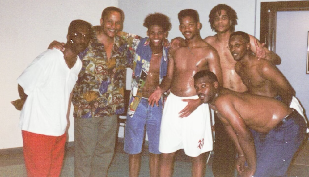 Backstage with Jazzy Jeff, The Fresh Prince and the partially-clothed Lil John Roberts (third from the left).
