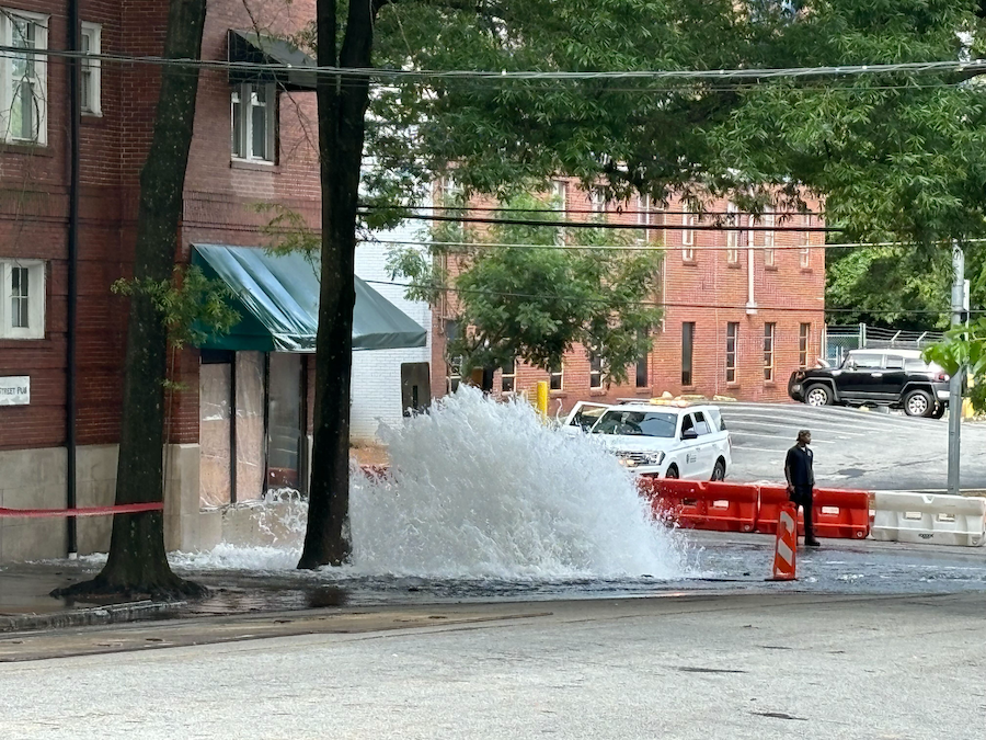 Water gushing from a broken water main at 11th and West Peachtree in Midtown on Sunday morning, June 2. (Photo by Beth McKibben)