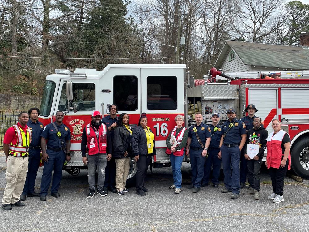American Red Cross of Georgia pictured with the City of Atlanta Fire Department in a March 2024 photo as they collaborated in securing homes with fire alarms.