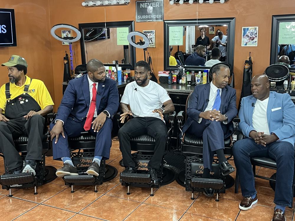 At Rocky's Barbershop in Buckhead, Trump supporters chatted with business owners. (R to L Latron Price, fmr Sec. Ben Carson, Rocky’s barbershop owner, Rep. Byron Donalds, Marc Boyd) on Wednesday, June 25, 2024.