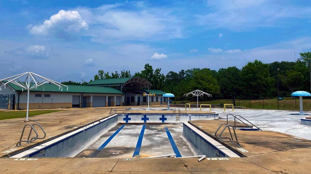 A file photo of a drained, dirty community pool at Shirley Winston Park in Columbus, Ga.