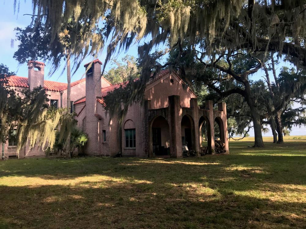 The 1924 Spanish Revival style Torrey-West Home on Ossabaw Island is shown in this view from its side.