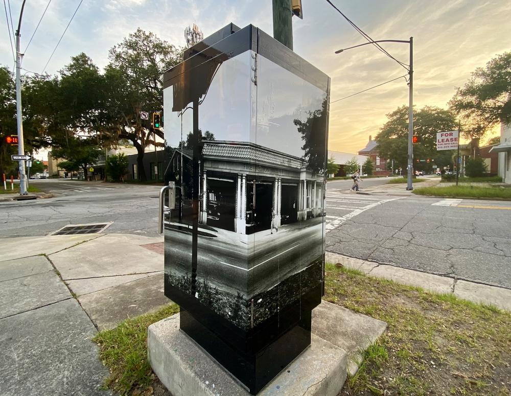 A 1965 photo of a Savannah fire station is shown on the traffic cabinet wrap at the corner of Bull Street and Henry Street.