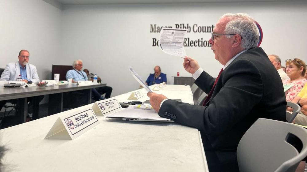 David Sumrall, chair of the Bibb County Republican Party, presented a spreadsheet and some voter registration records to the county elections board on Monday, July 2, 2024. He accused hundreds of voters of fraud. Jesse Fraga/The Telegraph