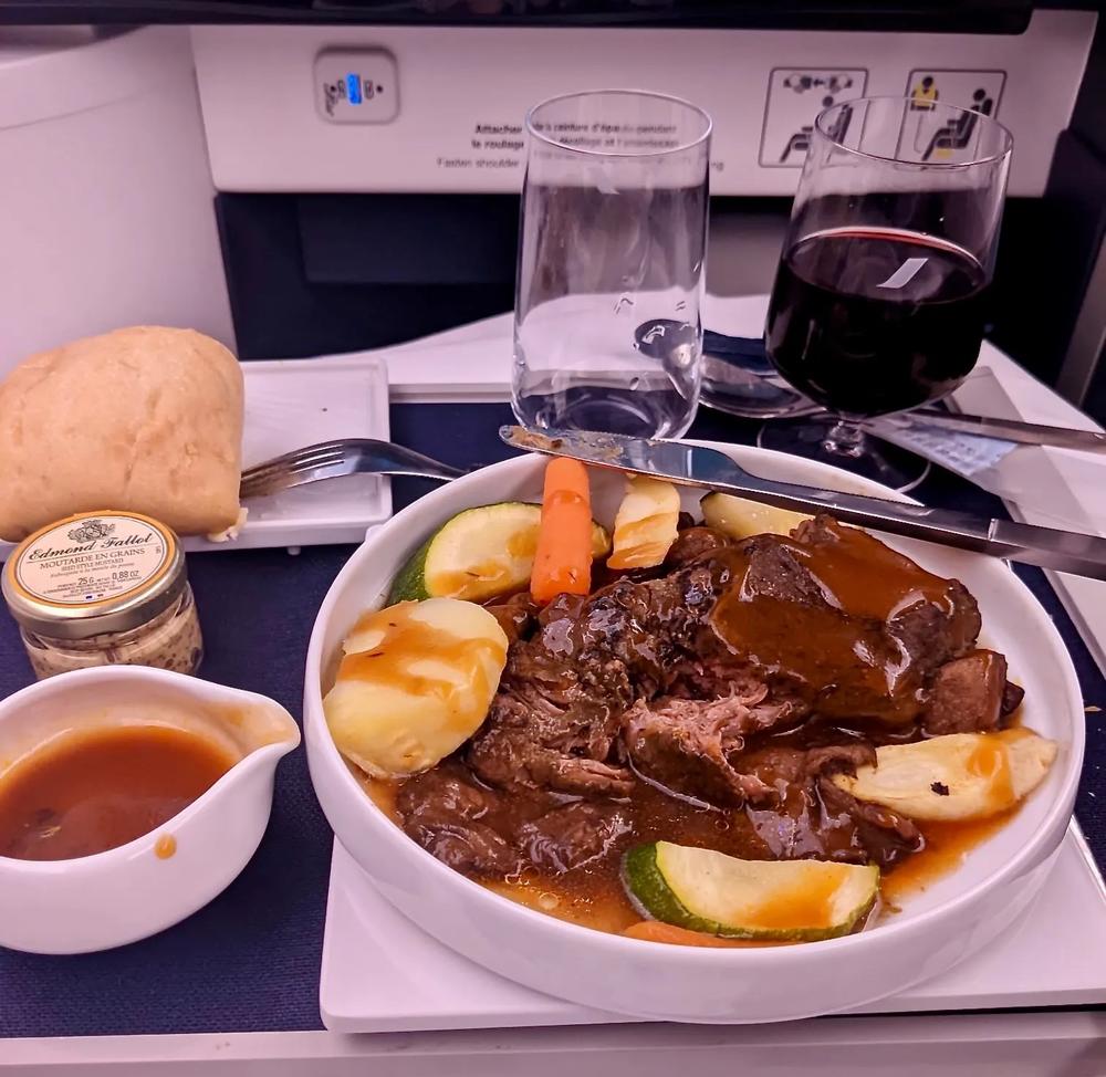 An example of First Class cabin dinner service on Air France. (Photo by Krista Haygood)