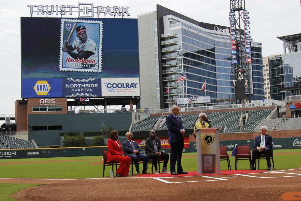 Billye Aaron, Hank Aaron's widow, speaks at Truist Park at the unveiling of the new Hank Aaron stamp on Wednesday, July 31, 2024.