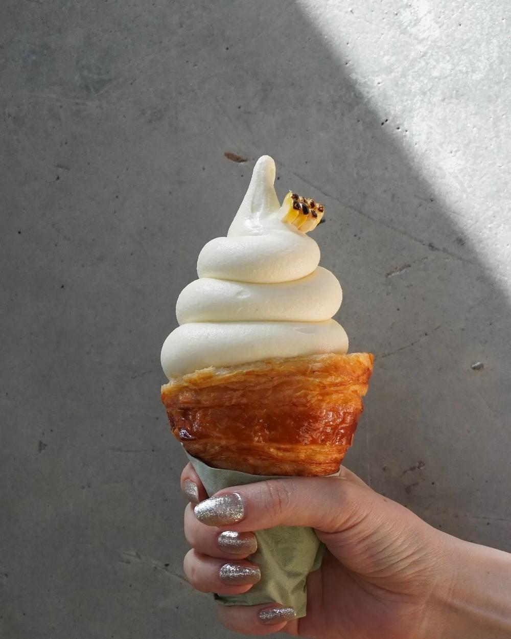 Sweet corn soft serve in a croissant cone from Momo Cafe in Midtown. (Provided by Momo Cafe)