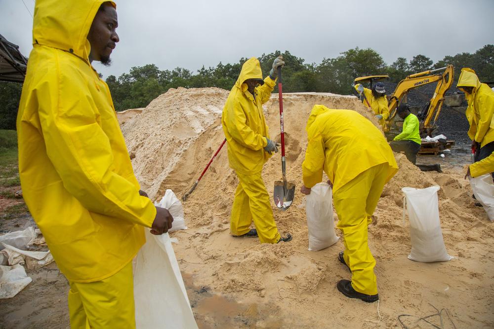 In Warner Robins, sandbags were prepared as people waited in long lines to take them home. Photo by Grant Blankenship